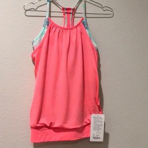 Ivivva size 14 girls tank top with double layer.